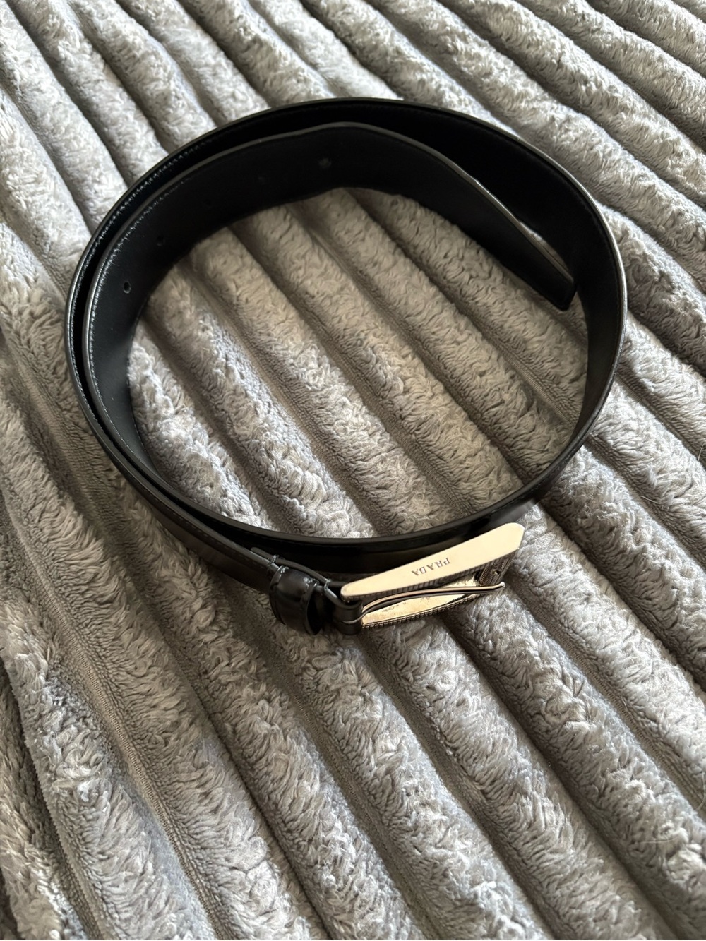 Prada Men's Black Leather Belt with Polished Silver Logo Buckle